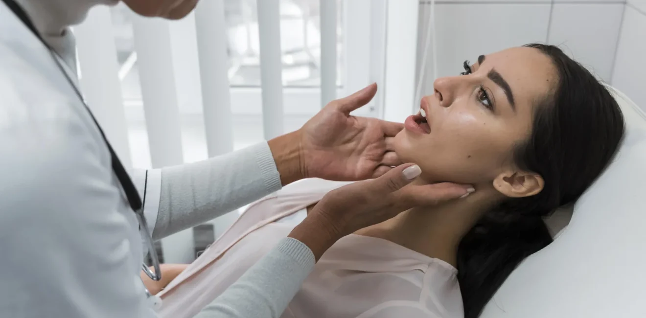 doctor-checking-patient-s-mouth