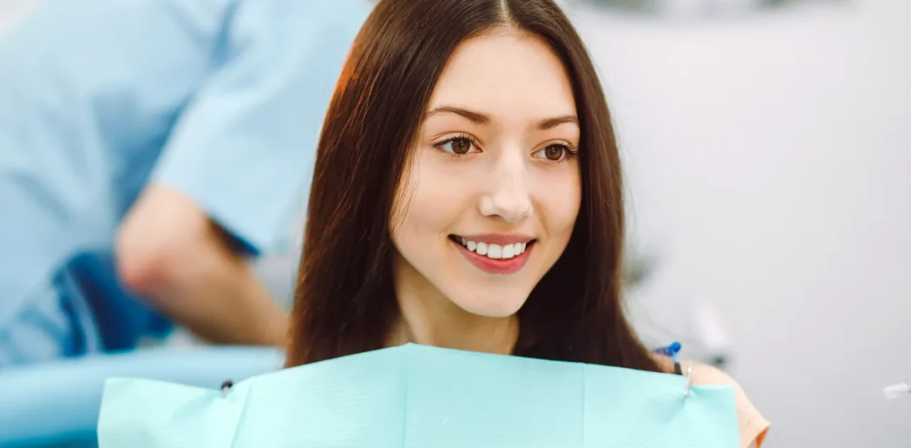 smiling-patient-waiting-his-dental-checkup